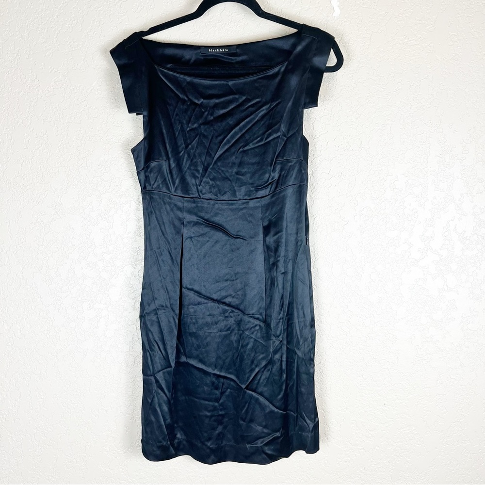 Black Halo size 6 black sleeveless, pocketed dress, left side zipper